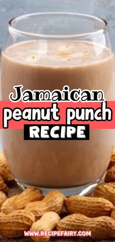 a glass filled with peanut butter next to peanuts on top of a wooden table and the words, jamaican peanut punch recipe