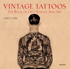 an old book with tattoos on the front and back of it's cover is shown