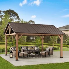 a covered patio with chairs and tables