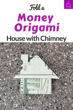 a house with chimney on the cover of a money origami book, which is written