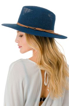 Bring breezy shade to your next trip with this paper straw Panama hat that adds sunny-day ease to any style. 3" brim Paper/polyester Hand wash, dry flat Imported Lightweight Packable Sun Hat For Summer, Casual Lightweight Boater Hat For Outdoor, Blue Brimmed Sun Hat For Day Out, Blue Wide-brim Hat For Day Out, Blue Summer Sun Hat For Day Out, Blue Wide Brim Hat For Day Out, Casual Paper Straw Boater Hat, Casual Packable Straw Hat For Outdoor, Casual Panama Hat With Short Brim For Warm Weather