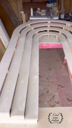 an unfinished bench being built in a garage