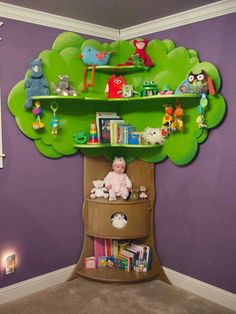 a child's book shelf with stuffed animals and toys on it in the corner of a room