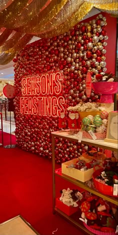 a red carpeted room filled with lots of christmas decorations