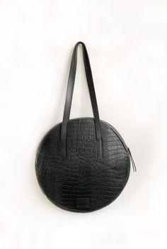 "This Black leather bag - beautiful and simple unisex. Shoulder bag for your city adventures. Leather tote bag not very big, yet functional. There is one big compartment, two pockets and a detachable shoulder strap. The bag is round-shaped. You can wear it every day and be one of the most stylish girls! It can also be a great gift for mom, wife, girlfriend and of a big use. Please, choose your color at the left pane, according to the attached and numbered photo. On the main photo - dark blue. PL Simple Bag, Laptop Bag For Women, Black Leather Bag, Black Leather Tote Bag, Bag Elegant, Elegant Bags, Leather Laptop Bag