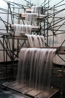 the waterfall is being constructed with scaffolding