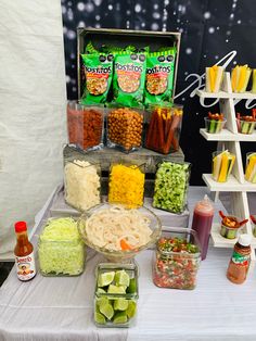 a table topped with lots of food and condiments