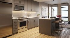 a modern kitchen with stainless steel appliances and wood flooring is pictured in this rendering