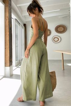 "Feel otherworldly in this ethereal olive green jumpsuit! Ideal for getting that spring-boho-chic look, this one-shoulder asymmetric straps wide leg style will have you feeling like the goddess you are. Slay queendom! ️   65% Viscose, 30% Polyester, 5% Elastane Machine Wash, Hand Wash measurements (inch): S: bust 34.6, hip 40.2, length 10.7, inseam 27.6, bottoms 28.4, waist 28.3, outseam 42.4 M: bust 36.6, hip 42.1, length 11, inseam 27.6, bottoms 29.5, waist 30.3, outseam 42.9 L: bust 38.6, hip Asymmetric Jumpsuit, Look Winter, Wide Leg Jumpsuits, One Shoulder Jumpsuit, Bodo, Long Jumpsuits, Asymmetrical Design