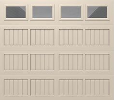 a white garage door with four windows