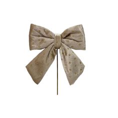 a bow tie on top of a wooden stick