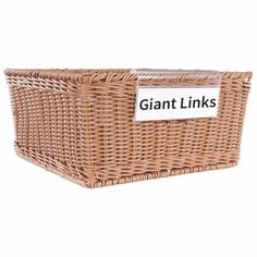 a large wicker basket with a label that says giant links on the front and bottom