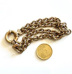 link chain bracelet French maille doré gold tone metal two strand row chunky retro bling vintage jewellery chaine maillons adult size 1980s * sourced in France * genuine French vintage  maille 'mesh' bracelet in overall very good condition - clasp works well, a light patina over the two strands, please see video and photos provided * adult size length 20cm (8") approx * weight 40g * listed price includes shipping Great vintage French maille bracelet - chunky version with two strands and a big cl Gold Double Chain Bracelet For Formal Occasions, Metal Link Chain Bracelet With Gold Clasp, Vintage Gold Chain Bracelet, Vintage Gold Jewelry With Chain Strap, Vintage Gold Bracelet With Chain, Vintage Metal Bracelets With Gold Chain, Gold Metal Chain Bracelet With Double Chain, Gold Double Chain Bracelet, Vintage Gold Chain Metal Bracelet