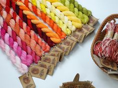 "Colour 13 Set: CT01 to CT13 - Cotton embroidery thread - Variegated Color type. This collection is available as either: 13 60-yard skeins or 13 30-yard skeins. The skeins are comprised of one-yard-long pieces of six-strand floss. A 60-yard skein is 60 one-yard-long pieces of floss and a 30-yard skein is 30 one-yard-long pieces of floss. Fine cotton thread with moderate shine. Embroidery thread is hand-dyed in our traditional craft village. Cotton thread with fine texture and delicate color at v Multicolor Embroidered Saree In Silk Thread, Festive Silk Thread Embroidered Fabric, Unstitched Embroidered Silk Thread Sets, Multicolor Silk Thread Embroidered Fabric, Bohemian Multicolor Silk Thread Embroidered Fabric, Wooden Needle, Thread Types, Types Of Embroidery, Cotton Embroidery