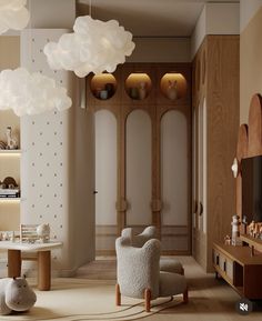 a living room filled with furniture and lots of clouds hanging from the ceiling above it