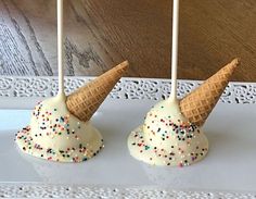 two cake pops with ice cream and sprinkles