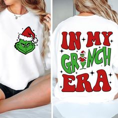 the grinch era shirt is being worn by a woman