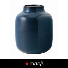 a blue vase is shown with the name macy's on it and an image of a red star