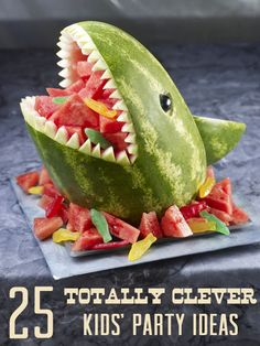 a watermelon shaped like a shark with its mouth open