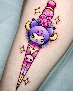 a cartoon character on the thigh with an ice cream cone and stars around her leg