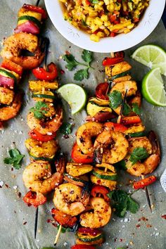 grilled shrimp skewers with corn on the cob and cilantro