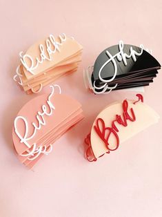 four different types of business cards with the word bridal written on them, all in white and pink