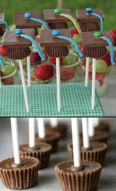 there are many chocolates on the stick with blue icing