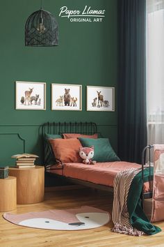 a bedroom with green walls and pictures on the wall, including an animal bed frame