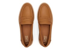 This slip-on shoe offers a modern take on the lug sole loafer trend. Inspired by the comfort of our bestselling boots, the must-have Cara features stylish leather uppers and a silhouette that looks great with jeans, skirts, dresses, and more. Look good, feel good, and do a whole lot of good. WEAR TOMS. WEAR GOOD. | Leather upper. TOMS leather products support responsible manufacturing via the Leather Working Group. Cushioned and durable EVA midsole. Custom CloudBound™ insoles for all-day comfort Winter Business Shoes Women, Business Professional Shoes For Women, Office Work Shoes, Fall Workwear Slip-ons With Plain Toe, Fall Slip-ons For Workwear, Medium Width, Casual Platform Loafers With Removable Insole For Fall, Casual Platform Loafers With Removable Insole For Business, Leather Platform Loafers With Cushioned Footbed For Fall, Modern Slip-ons With Lug Sole For Work