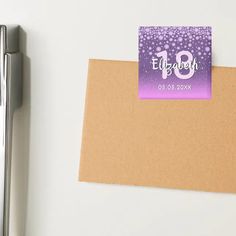 a notepad with the number nine on it next to a pen