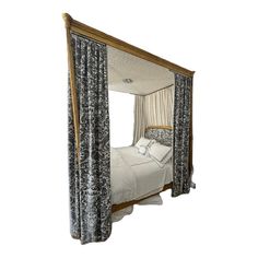 An absolute stunner.  Gilded four poster bed by Dennis & Leen, custom furniture makers. Headboard, footboard and bedhangings in black and white Fortuny fabric.  Canopy in silk fabric with beading and handmade flower by Schneller & Sons (who also made the hangings), a workroom to the trade only, working with top tier designers.  Custom chair in Fortuny fabric and coordinating Fortuny curtains (two pairs) also available through Chairish.  About Dennis & Leen(from their website)  Dennis & Leen was Bed With Canopy, Fortuny Fabric, Fabric Canopy, Four Poster Bed, Custom Chair, Four Poster, Poster Bed, Louis Xvi Style, Louis Xiv