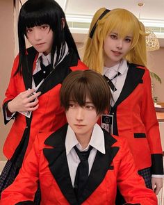 three young people dressed in red and black outfits posing for the camera with their hands on their hipss