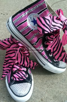 "Hot Pink and Black Chucks that Sparkle with rhinestone crystals complete on the toes and outlining the name you have them personalized with. The hot pink and black ribbon just sets them off, and they are really just a really fun pair of kicks to add to your wardrobe. Completely one of a kind. I can customize the colors too, should you not be a fan of pink, Wouldnt these look awesome in a metallic turquoise or peacock blue? This listing is for Womens sizes 4-11 in this design. Just polka dots, s Personalized Converse, Hi Top Converse, Converse Design, Painted Converse, Black Chucks, Bling Converse, Custom Bling, Funky Shoes, Bling Shoes