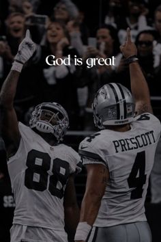 two football players with their arms in the air and one holding his hand up to say god is great