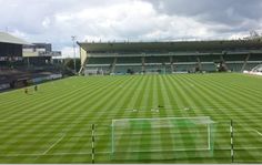 an empty soccer field with players on it