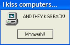 a computer screen with the words i kiss computers and they kiss back