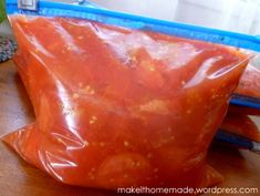 a bag of food sitting on top of a wooden table