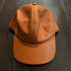 A New Day Pleather Camel Colored Ballcap With Stretchy Back Instead Of Snap Or Threaded. Nwt Leather Cap For Fall, Casual Brown Leather Hat, Trendy Leather Hat For Fall, Casual Leather Baseball Cap With Curved Brim, Casual Leather Hats For Spring, Adjustable Brown Leather Baseball Cap, Chic Leather Hat For Fall, Brown Cap For Everyday Wear, Brown Cap For Everyday