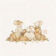 two mice are sitting on pumpkins and one mouse is holding something in his hand