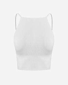 The Cheri Low-Back Ribbed Crop Top is one of those rare sophistication-oozing basic essentials. Featuring a chic square neck and adjustable straps, this top offers a perfect blend of comfort and style. The ultra-stretchy, ribbed fabric hugs your body in all the right places, while the low-cut back and thick ab band add a touch of sensual flair. Designed for ultimate convenience, this bodycon top slips on easily and adheres to your silhouette beautifully. Enhance your capsule wardrobe with this v Basic Essentials, Bodycon Tops, Ribbed Crop Top, Hug You, Ribbed Fabric, Low Back, Low Cut, Square Neck, Capsule Wardrobe