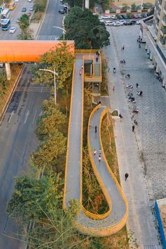 an aerial view of people walking on the street