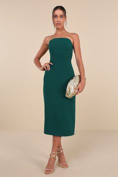 You know you're making the right choice when you reach for the Lulus VIP Instinct Emerald Green Strapless Midi Dress! Lightweight flat-woven fabric shapes a strapless bodice with a straight neckline, hidden supportive boning, and hidden no-slip strips. Figure-skimming skirt falls to a midi hem with a kick pleat at back. Hidden zipper/clasp at back. Fit: This garment fits true to size. Length: Mid-calf length. Size medium measures 42.5" from top to bottom. Bust: Great for any cup size. Waist: Fit Green Dresses Formal, Strapless Green Dress, Midi Dress Strapless, Dress And Shoes, Green Cocktail Dress, Emerald Green Dresses, Strapless Midi Dress, Kick Pleat, Midi Cocktail Dress