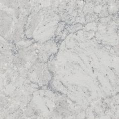 a close up view of white marble