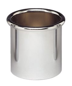 an empty silver cup on a white surface