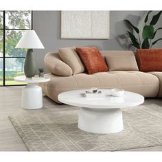 Product Features Include：Coffee Table *1 Color: Engineering Marble & White High Gloss Finish Materials: Metal, Composite Wood, Engineering Marble Catalog Size: 40"Dia x 14"H Assembly Required: Yes Step into a world of serenity with this stunning Zaid collection table set in a pristine white finish These tables blend seamlessly with any decor, creating a tranquil and sophisticated atmosphere Perfect for both modern and classic interiors, the minimalist design offers a clean and airy feel Whether Wood Engineering, Classic Interiors, Acme Furniture, Faux Marble, Classic Interior, Living Room Coffee Table, Decor Display, Composite Wood, Round Coffee Table