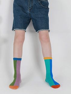 Make a bold statement with our Color Block Asymmetrical Cotton Socks. Featuring a dynamic design of contrasting colors and asymmetrical patterns, these socks add an edgy twist to your outfit. Crafted from soft and breathable cotton, they provide comfort and style all day long. Whether you're pairing them with sneakers for a casual look or dressing up with boots for a night out, these socks are sure to turn heads. Step into fashion-forward style with our Color Block Asymmetrical Cotton Socks! You Trendy Multicolor Socks For Spring, Trendy Blue Knee-high Socks For Winter, Trendy Blue Socks For Summer, Trendy Blue Summer Socks, Blue Cotton Socks For Summer, Trendy Blue Socks For Winter, Trendy Blue Winter Socks, Trendy Multicolor Stretch Knee-high Socks, Retro Multicolor Cotton Socks