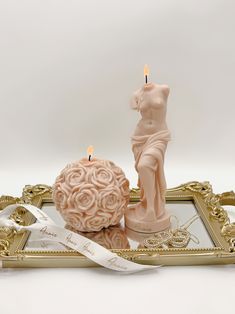 a candle that is sitting on top of a tray