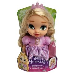 a doll with blonde hair wearing a pink dress and tiara on it's head