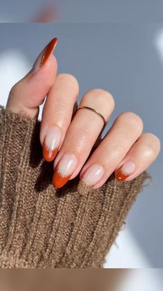 Fall Almond Nails Ideas Sparkle, Orange Gel Nails Fall, Fall Nail Designs Autumn French Tip, Red And Gold Tip Nails, Terracotta Nails Wedding, Rust Colored Nails Designs, Rust Red Nails Design, Round Thanksgiving Nails, Orange And Gold French Tip Nails