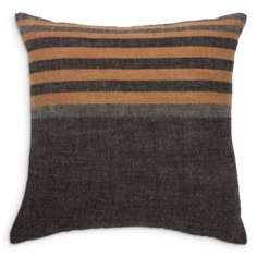 a brown and black striped pillow on a white background